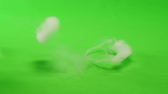 Smoke Rings on Green Chroma Key Background alt