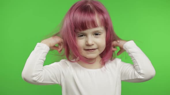 Positive Child Girl Emotionally Make Faces, Plays with Her Pink Hair. Chroma Key