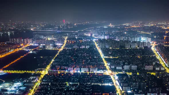 Aerial top view of city at night，timelapse