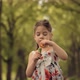 Girl Blowing Soap Bubbles. Family Having Fun In Park. Preschool Kid Leisure Outdoor Soap Bubble. - VideoHive Item for Sale