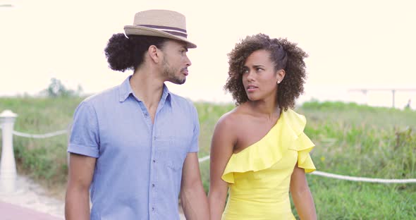 Couple Walking Together in Park