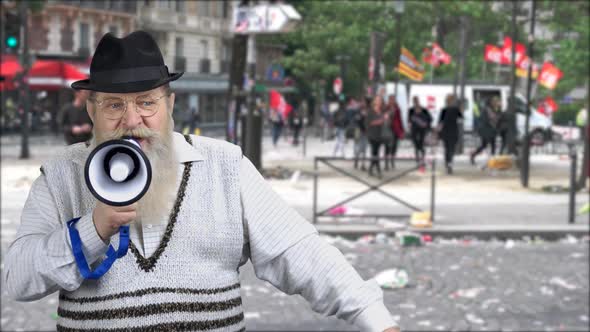 Old Confident Man Shouting Into Megaphone