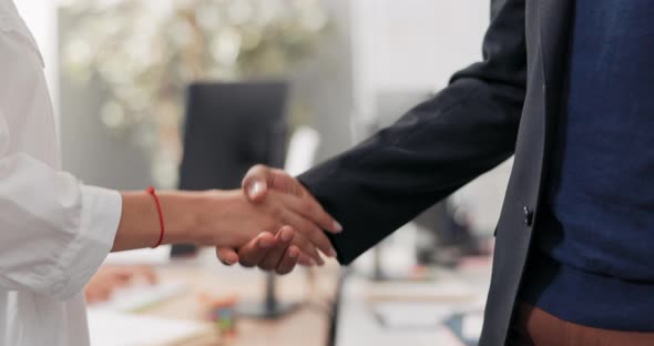 Closeup of Women and Men Hands in the Middle of a Corporate Office in the Background Friendly