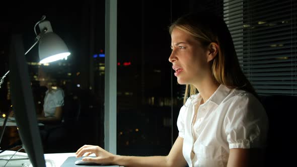 Businesswoman working over computer