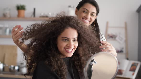 Video of women starting hair beauty treatments at home. Shot with RED helium camera in 8K.