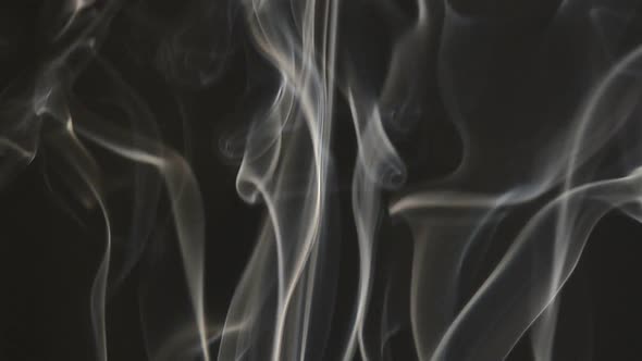 incense smoke on dark background