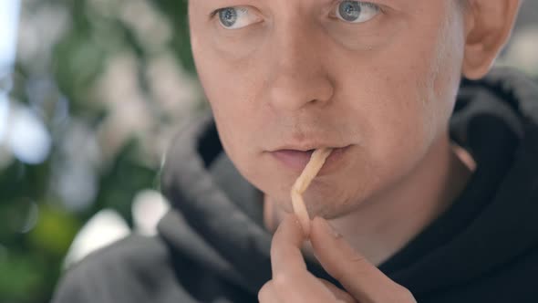 Mouth Close Up Man Student Eats French Fries and Drinks Cola at Fast Food Restaurant Unhealthy