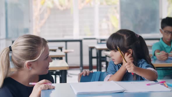 Friendly Female School Teacher and Latin Schoolgirl