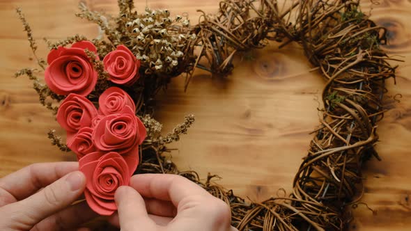 Female Hands Makes Valentines Day DIY Decoration