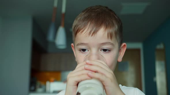 Little Boy Child Drinking Milk