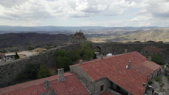 Defensive ramparts surrounding historical village, Sortelha; aerial arc