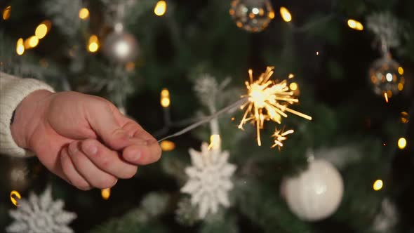 Close Up Shot of Bengal Fire in the Man's Hand