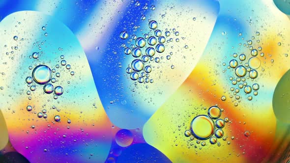 Oil Drops On A Water Surface Abstract Background