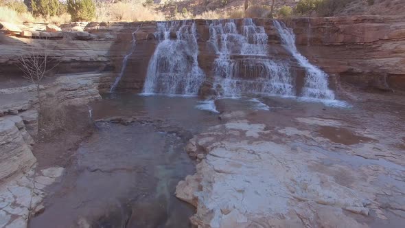 Aerial view flying up LaVerkin Creek past Toquerville Falls