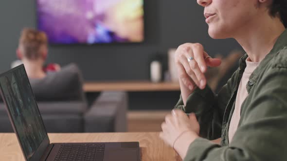 Woman Video Calling With Colleagues From Home