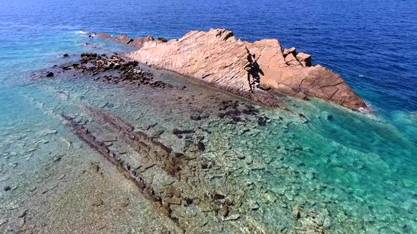 Small Islet Island Formed by the Accumulation of Rock Deposits Atop a Reef in the Sea