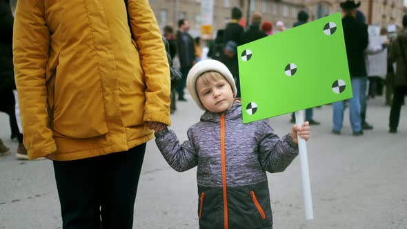 Mother with Child on Political Rally