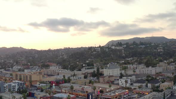 Aerial, Golden hour by the Hollywood sing hills, drone view