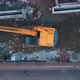 Aerial Top View Of Excavator Cleaning Construction Site - VideoHive Item for Sale