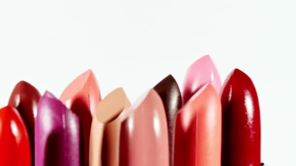 Colorful Lipstick Palette Rotation on White Background