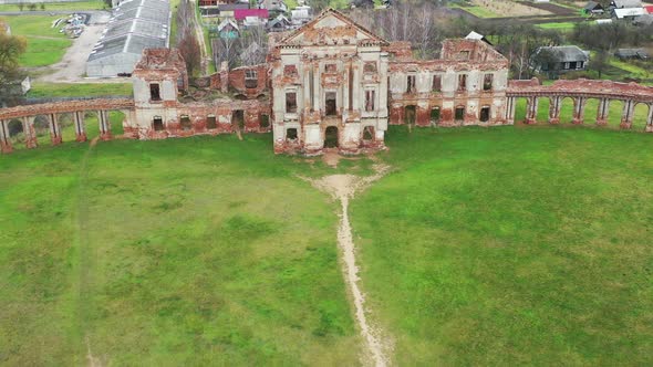 Ruzhansky Palace and the Ruins of the Facade of an Abandoned Ruined Building of an Ancient Castle of