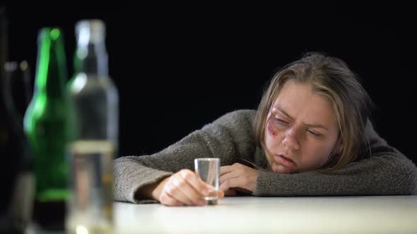 Desperate Weak-Willed Alcoholic Woman Drinking Vodka Suffering Hangover, Disgust