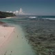Aerial View of Tropical Beach with Azure Blue Water and Foaming Ocean Waves - VideoHive Item for Sale