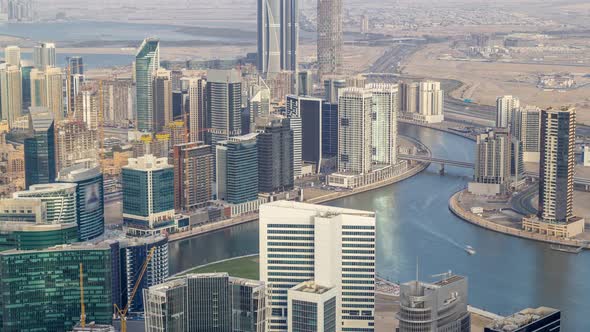 Panoramic Aerial View of Business Bay Towers in Dubai at Evening Timelapse