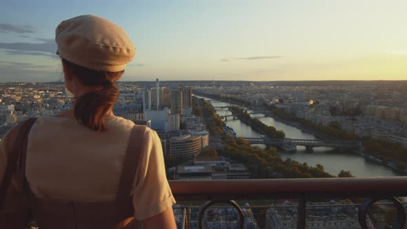 Young girl looking at the city