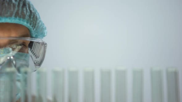 Researcher Taking Test Tube With Petrol Sample, Checking Product Quality