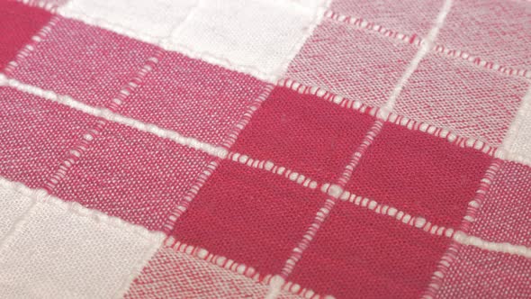 Checkered red  fabric pattern close-up 4K 3840X2160 UHD panning footage - Checkered red table cloth 