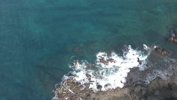 Wave crashing on rock