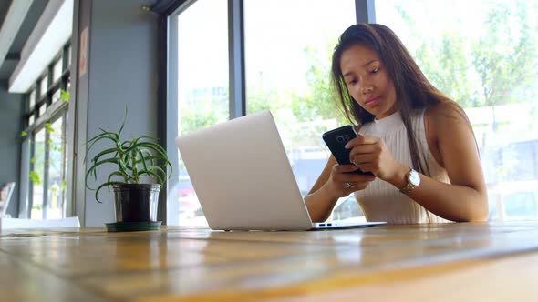 Teenage girl using mobile phone 4k