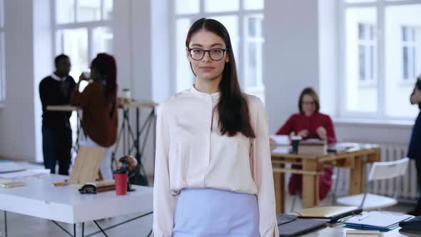 Portrait of Beautiful Young Focused Caucasian Business Woman in Eyeglasses, Formal Clothes Looking