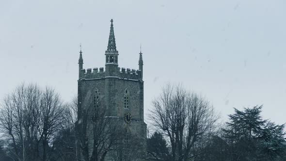 Church In Snowfall On Bleak Winter Day