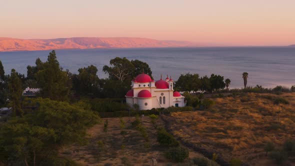 The 12 apostles church in Tiberias, Israel, sunset time aerial drone view 4k