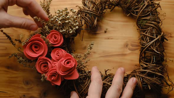 Female Hands Makes DIY Floral Wreath