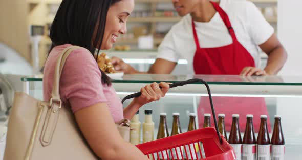 Animation of happy biracial waiter selling food to female customer