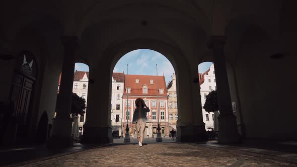 Attractive young girl in a city