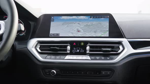 Infotainment GPS Navigation Screen in a Modern Car - Zoom-in Closeup