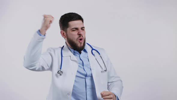 Happy Doctor Funny Dancing Success and Luck at Work