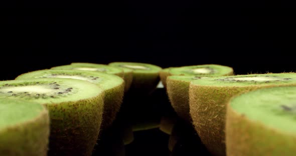 Juicy fresh kiwi fruit cut in half super macro close up 