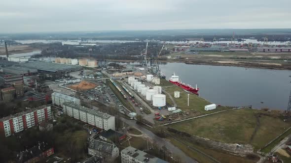 Oil tanker aerial view in port terminal