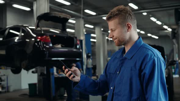 Man Voice Recognition with Smart Phone in Car Mechanic Workshop Service Factory Message Audio Welder