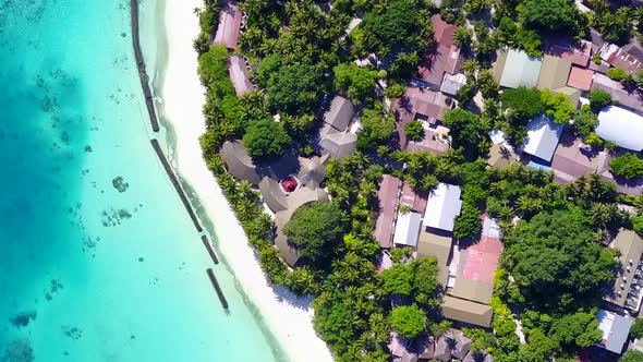 Aerial drone nature of tourist beach by blue lagoon with sand background