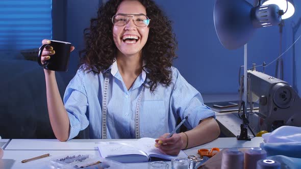 Portrait of Cheerful Designer Girl Laughs and Looks at Camera