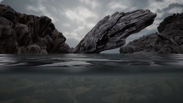 Half Underwater in Northern Sea with Rocks