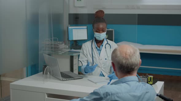 Woman Working As Medic at Healthcare Clinic