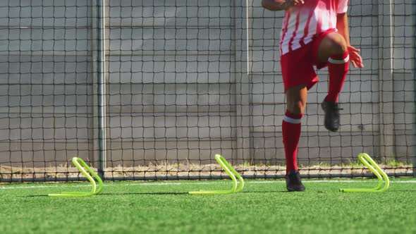 Soccer players training on field