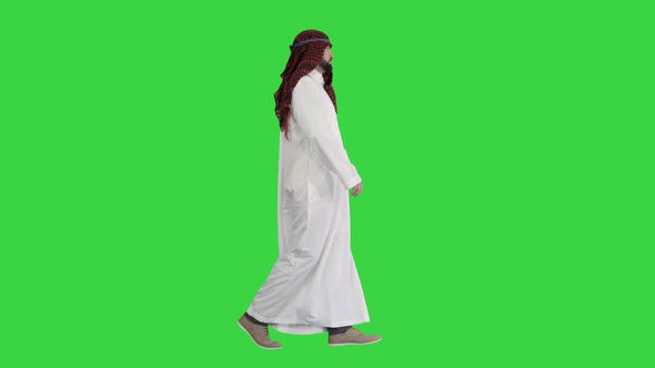 Serious Sheikh Having a Walk on a Green Screen Chroma Key